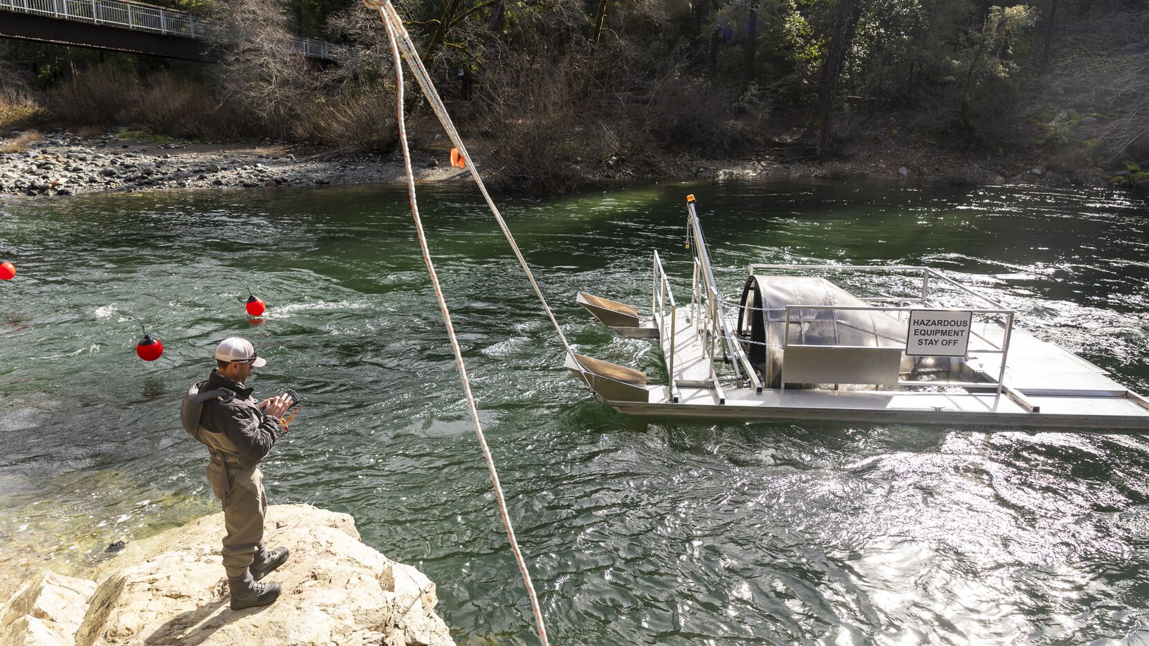 A biologist collecting data on an RST