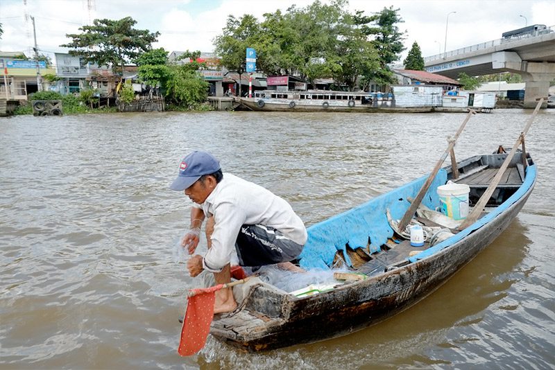 Scientists bought fish from this fisherman, the grandfather of the fisherman operating their research boat. Photo by Bao Quan Nguyen.