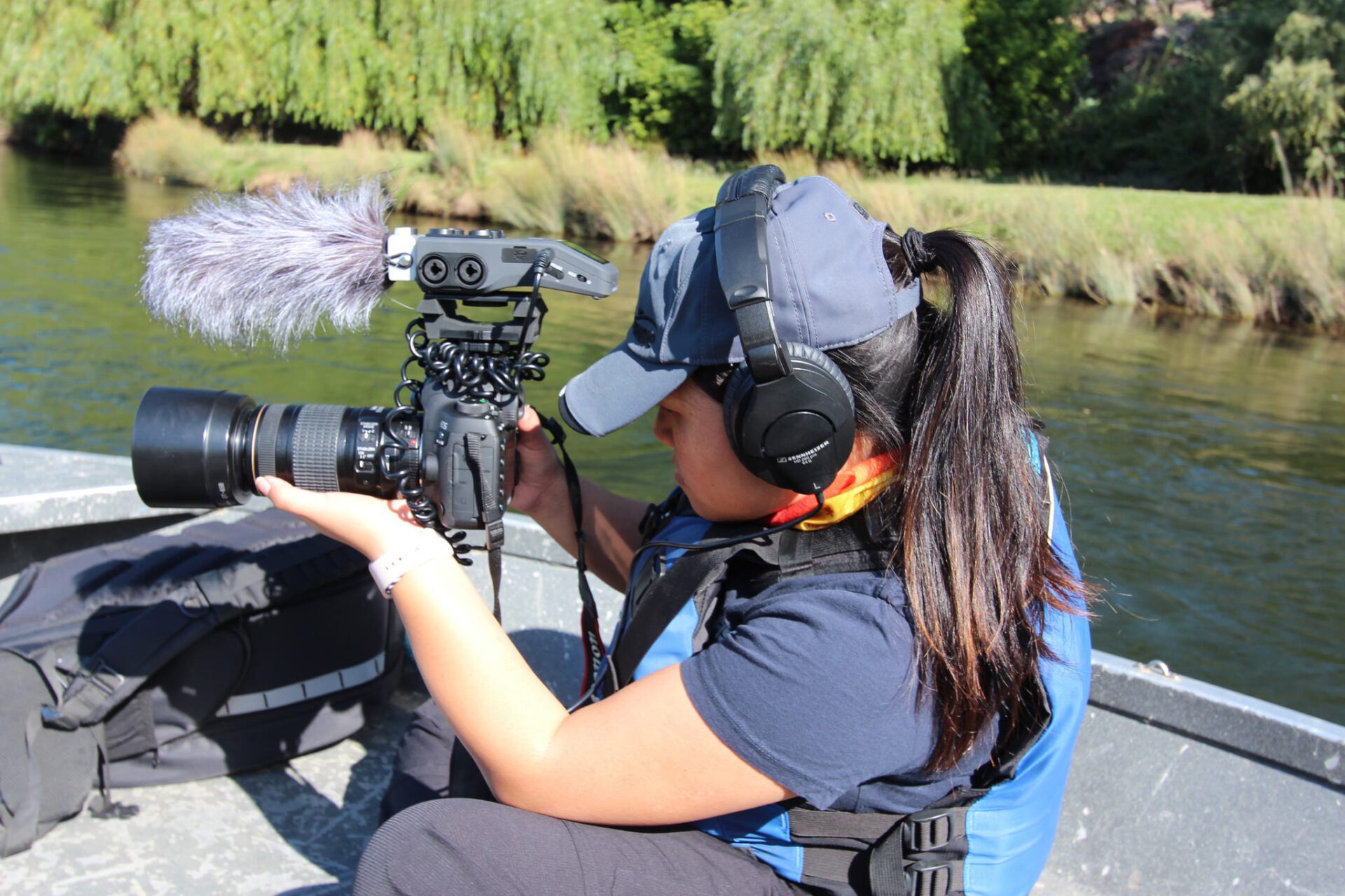 Dee video filming in the field