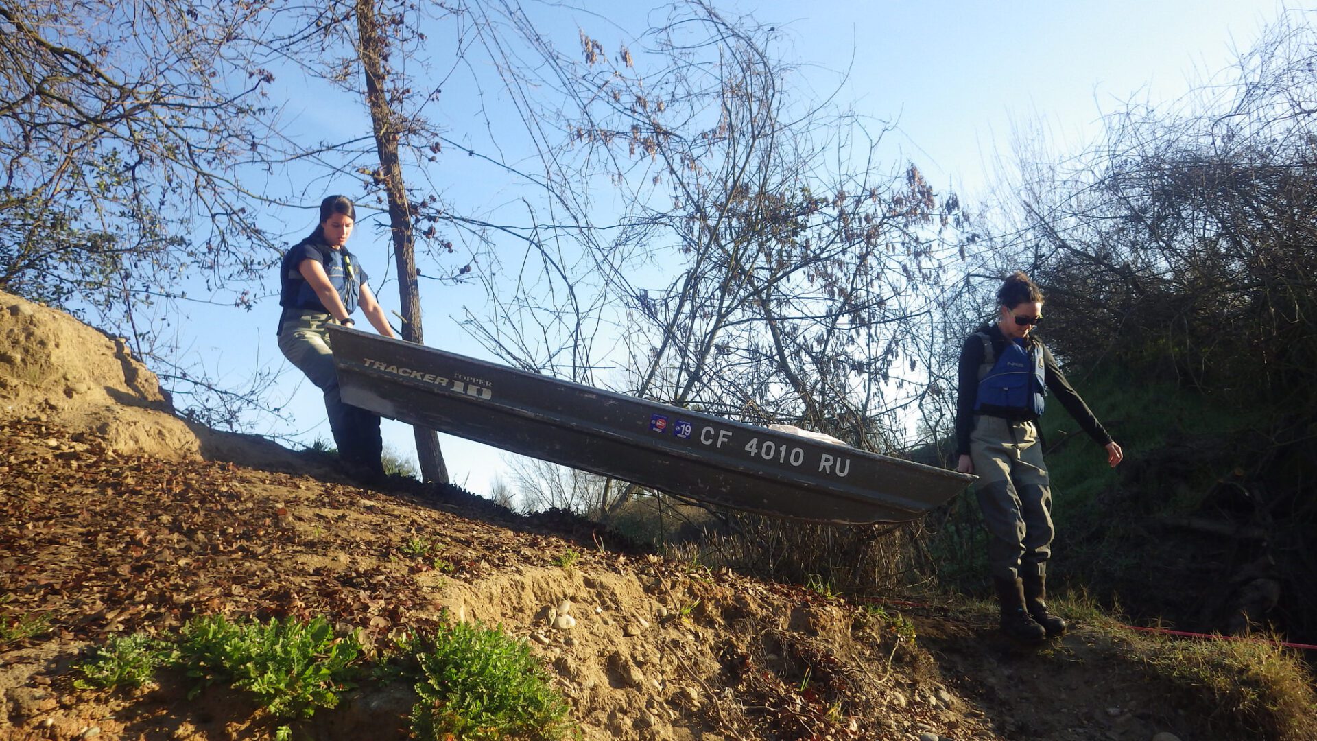 Launching a john boat - women in fisheries science